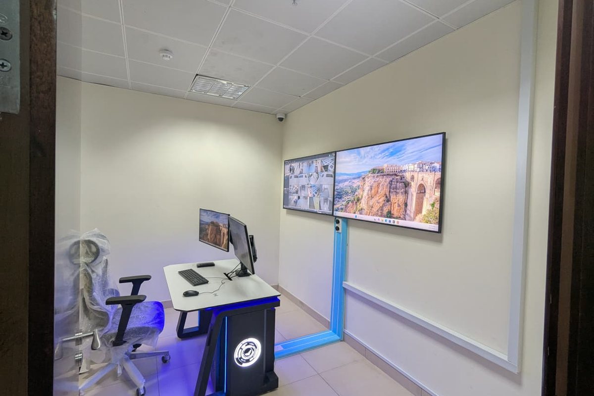 engineer commissioning CCTV surveillance cameras on site
