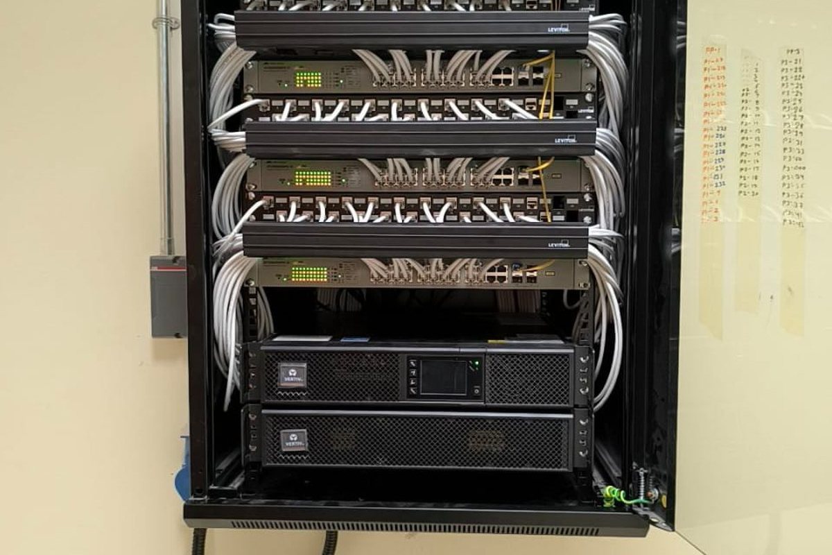 structured cabling rack with patch panels installed by Infosys Solutions